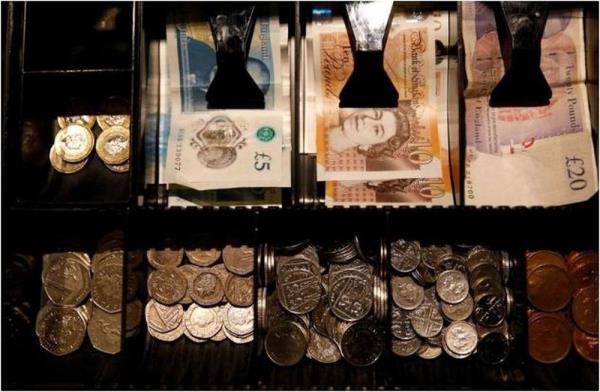 Sterling steady, set for monthly gain
