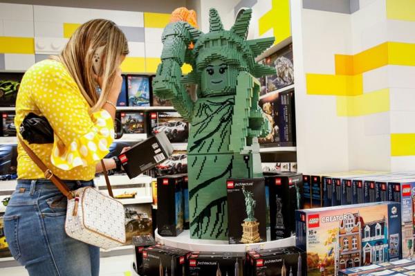 US consumer spending in July surges; weekly jobless claims fall